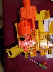 The disassembled Nerf Barricade showing its internal parts