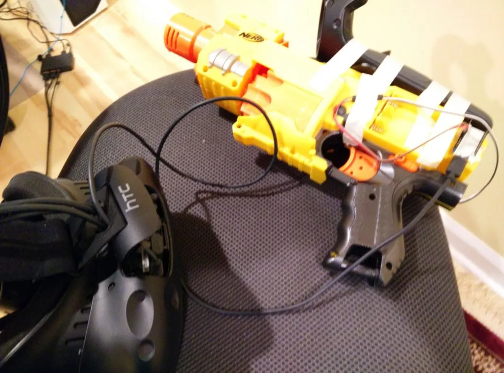 The finished Nerf prop wired up to the HTC Vive headset